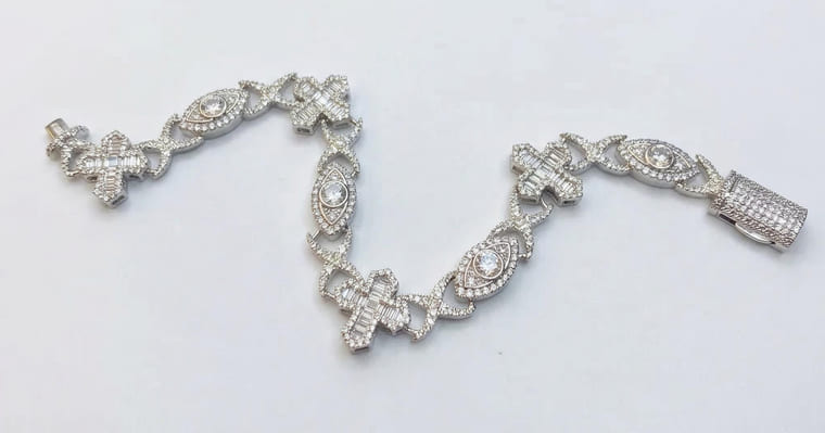 Silver crystal link bracelet, same shot on a generated backdrop
